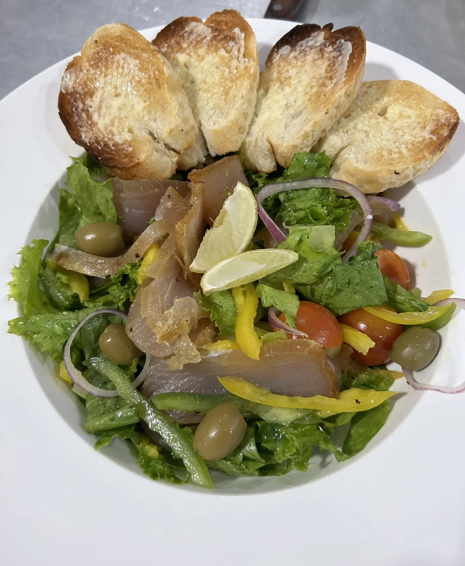 Smoked fish salad with toasted bread