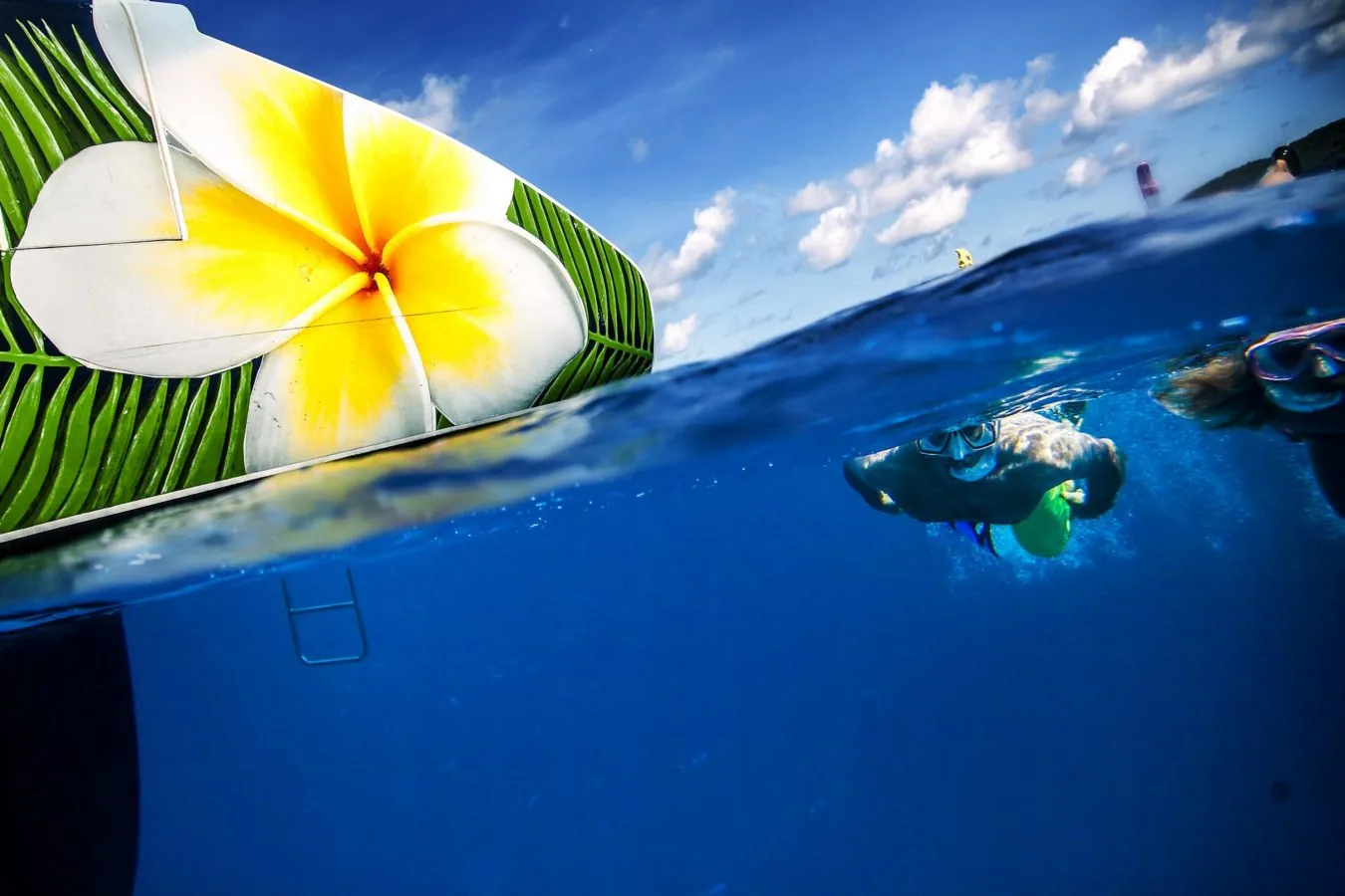 A snorkeller in clear blue water