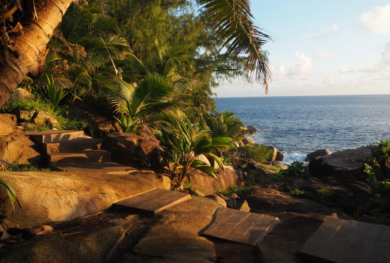 Stone steps down to the sea in the late sun