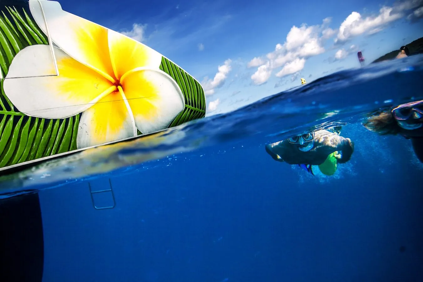 A snorkeller in clear blue water