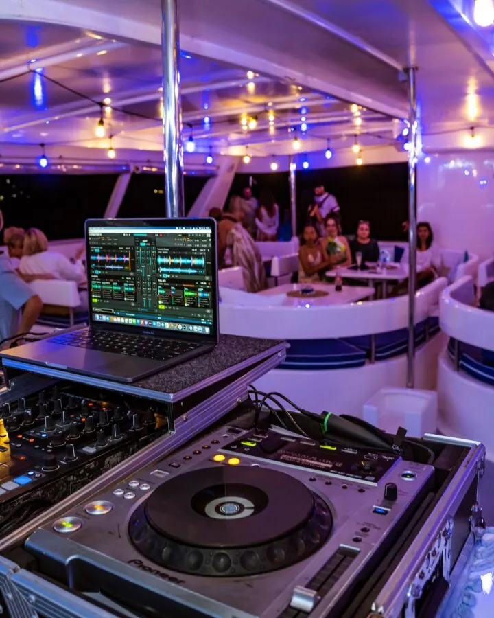 The DJ deck on board, with guests in the lounge