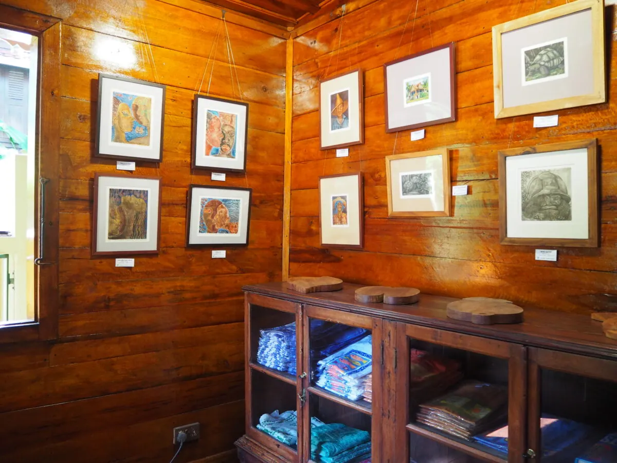Framed works on the walls inside the gallery